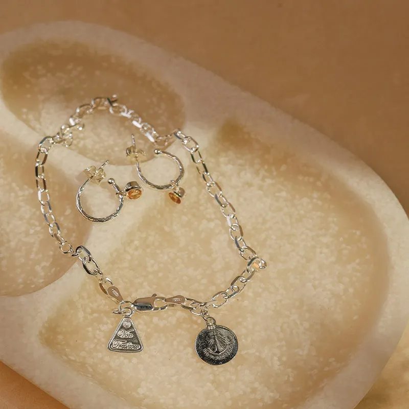 ANKLET WITH RELIGIOUS CHARM