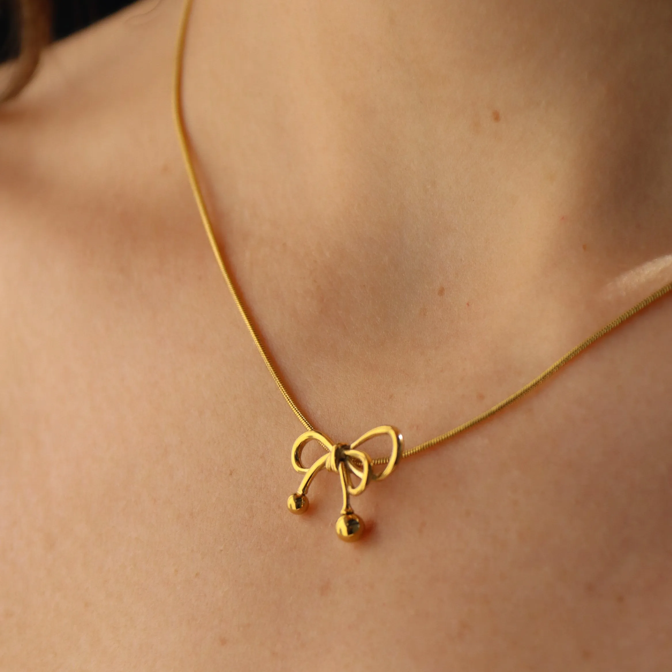 Nina - Gold Bow Necklace
