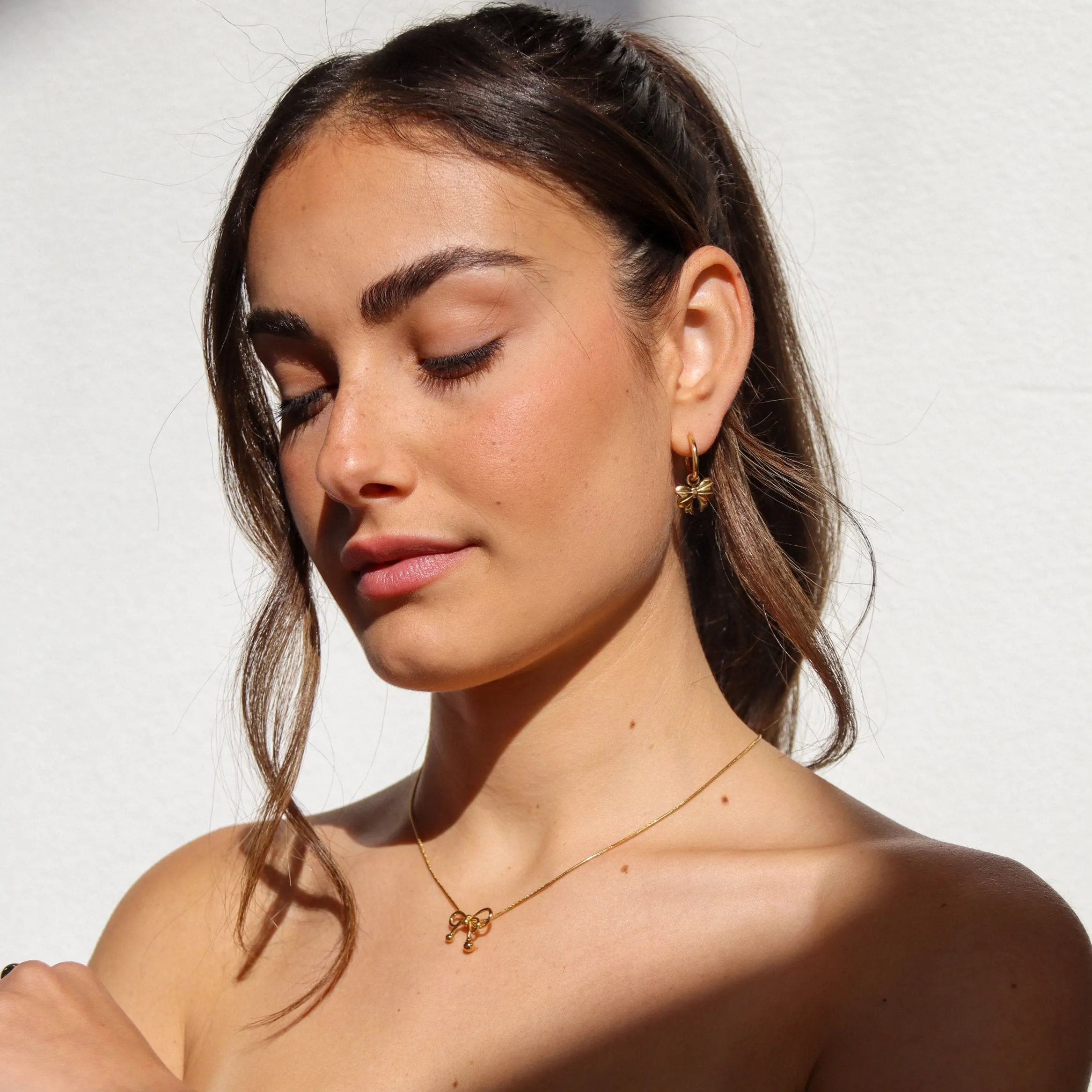Nina - Gold Bow Necklace